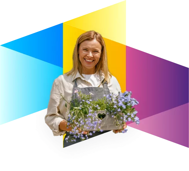 Zelfstandige professionele vrouwelijke bloemist tegen een kleurrijke geometrische achtergrond